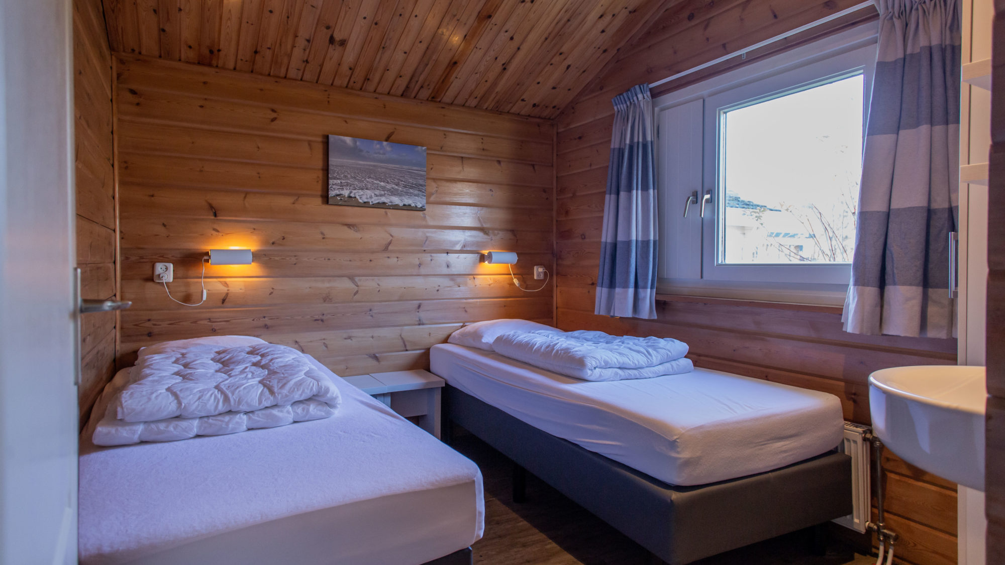Een persoonsbedden Finse bungalow Infrarood Sauna de Riesen Terschelling