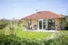 Terras grasveld Villabungalow openhaard Tjermelan Terschelling